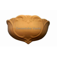 F002 - Fioriera da muro lavorata cm 32x18h F002 - Fioriera da muro lavorata cm 32x18h
